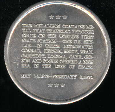 This Medallion contains metal that traveled through space on Skylab